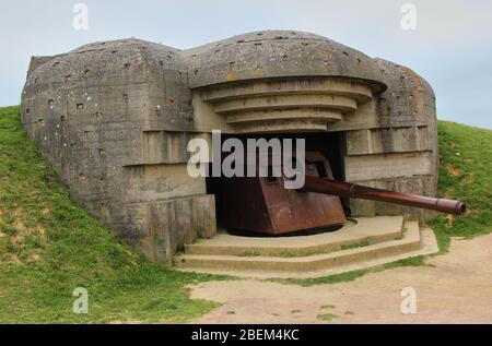 Resti della batteria tedesca che è stato catturato il 07 1944 giugno, Bunker e armi da fuoco Foto Stock