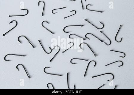 Ami da pesca su uno sfondo bianco. Foto Stock