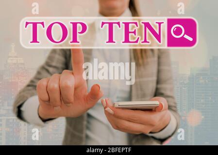 Scrittura a mano del testo Top Ten. Foto concettuale le dieci canzoni o registrazioni più popolari nelle classifiche musicali più popolari Foto Stock