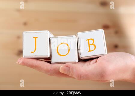 Parola di lavoro scritta con cubi di legno Foto Stock