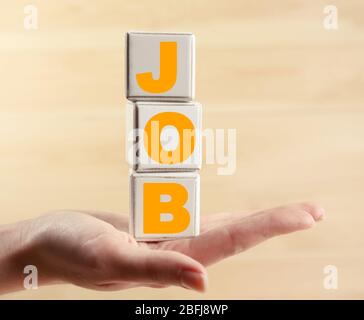 Parola di lavoro scritta con cubi di legno Foto Stock