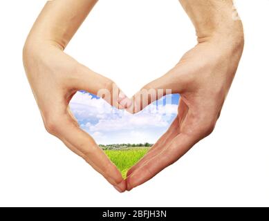 Bel campo di cuore formato da mani femminili isolate su bianco Foto Stock