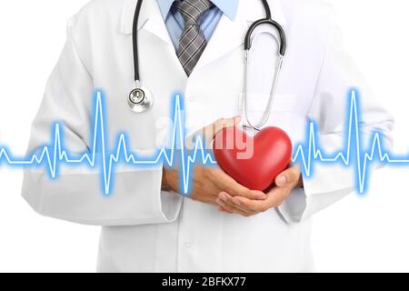 Medico tenendo cuore Foto Stock