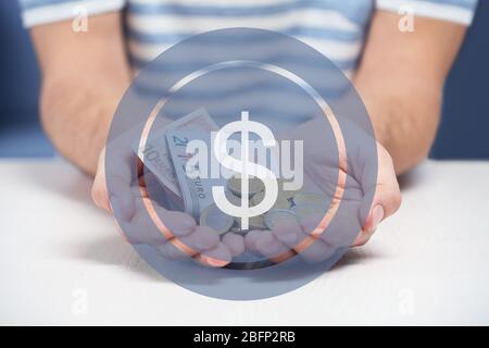 Icona dollaro. Uomo che detiene denaro Foto Stock