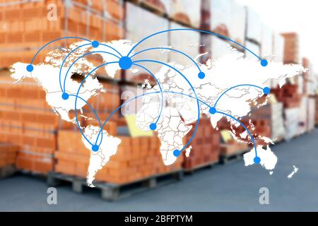 Mappa del mondo con rete logistica e mattoni per la distribuzione all'ingrosso sullo sfondo Foto Stock