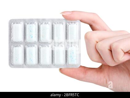 Blister con 10 gengive da masticare a mano isolate su bianco Foto Stock
