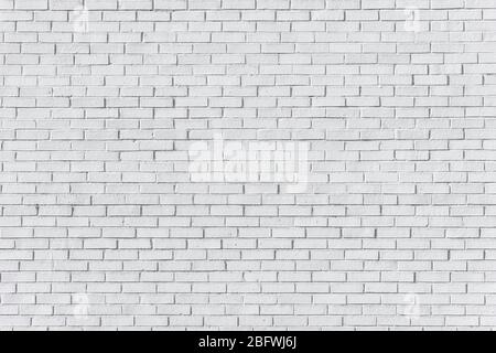 Parete in mattoni verniciata di bianco per texture o sfondo Foto Stock