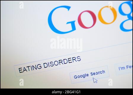 Disturbo alimentare digitato nella barra di ricerca sulla homepage di Google Foto Stock