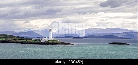 Faro di Eilean Musdile vicino a Oban, Argyll e Bute, Scozia, Regno Unito Foto Stock