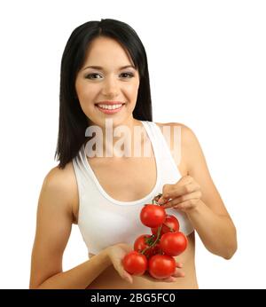 Ragazza con pomodori freschi isolato su bianco Foto Stock