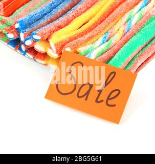 Vendita di caramelle dolci gelatinose isolate su bianco Foto Stock
