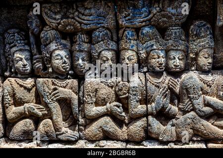 Pannelli di rilievo al Tempio di Borobudur, Yogyakarta, Giava Centrale, Indonesia Foto Stock