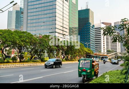 Tuk-tuk al quartiere centrale degli affari di Jakarta in Indonesia Foto Stock