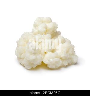 Latte probiotico biologico chefir grani davanti a un bicchiere di latte  Kefir Foto stock - Alamy