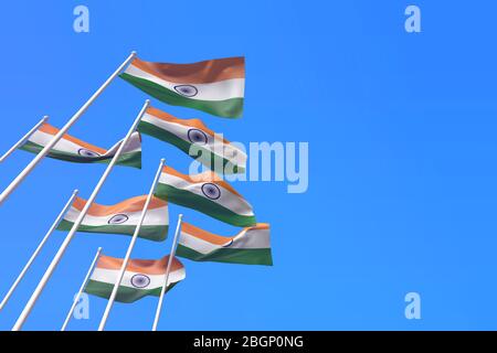 India bandiere che sventolano nel vento contro un cielo blu. Rendering 3D Foto Stock