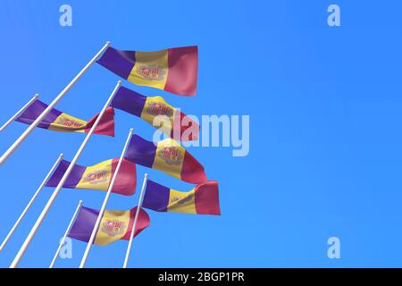 Le bandiere di Andorra sventolano contro un cielo blu. Rendering 3D Foto Stock