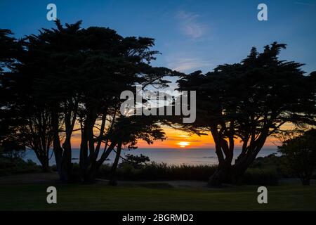 Tramonto sulla baia di St Ouen sulla costa occidentale di Jersey, Channel Isles Foto Stock