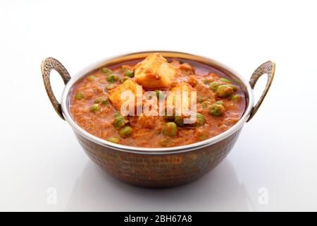 Mutter Paneer , formaggio indiano Dish Cottage e piselli immersi in un sugo di pomodoro di cipolla Foto Stock