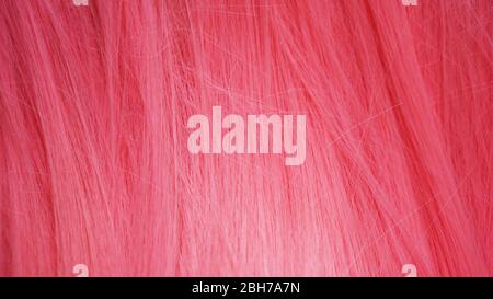 Rosa capelli parrucca texture Closeup. Può essere utilizzato come sfondo Foto Stock