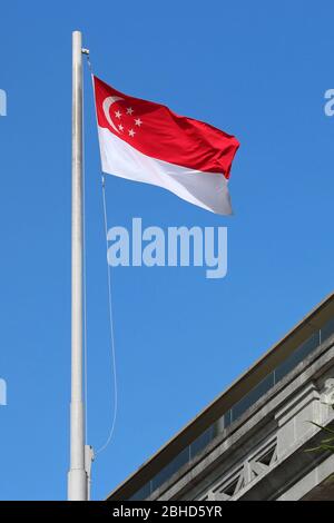 bandiera singaporiana a singapore Foto Stock