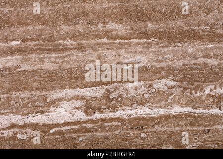 Sfondo in travertino marrone chiaro come parte del tuo interno perfetto. Texture di alta qualità. Foto Stock