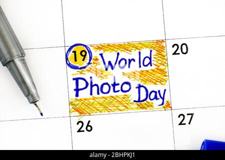 Promemoria Giornata Mondiale della Foto in calendario con penna. Agosto 19. Foto Stock