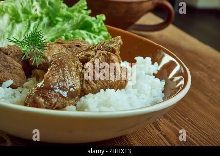 Manzo Suggerimenti sul riso, tenero stufato di manzo cotto, cibo comfort del sud. Foto Stock