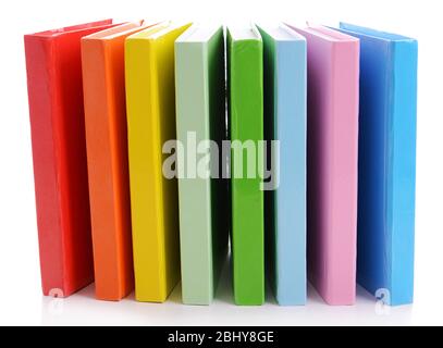 Pila di libri colorati isolato su bianco Foto Stock