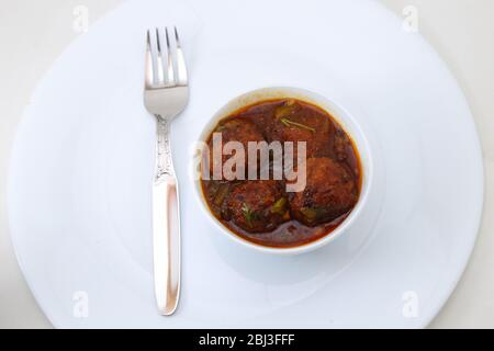 Manchurian con sugo Foto Stock