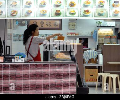 Strada lato cibo stallo, Hong Kong Foto Stock