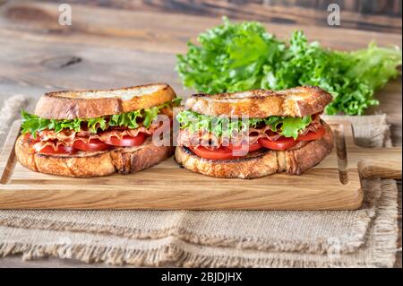 Panini BLT con pancetta, lattuga e pomodori Foto Stock