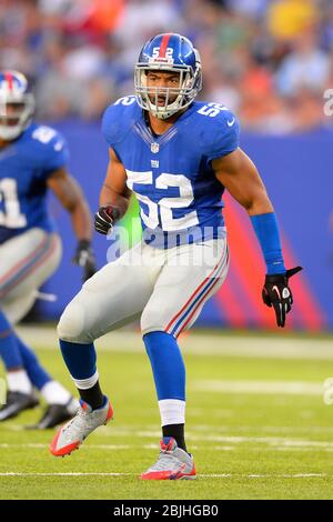 15 settembre 2013: New York Giants fuori dal linebacker Spencer Paysinger (52) durante una settimana 2 NFL di incontri tra i Denver Broncos e New York Foto Stock
