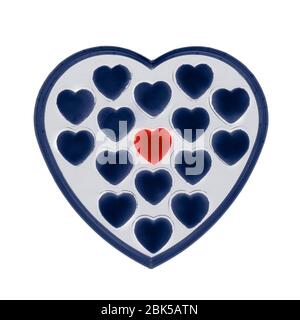 Cioccolatini a forma di cuore in una scatola, radiografia colorata. Foto Stock