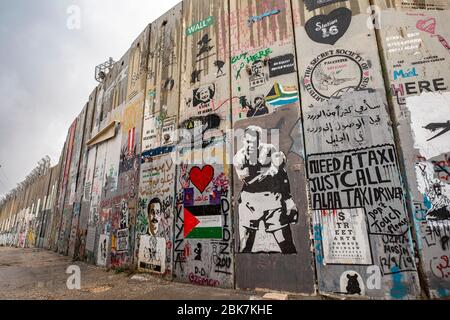 Graffiti al muro di confine di Israele a Betlemme, Palestina Foto Stock