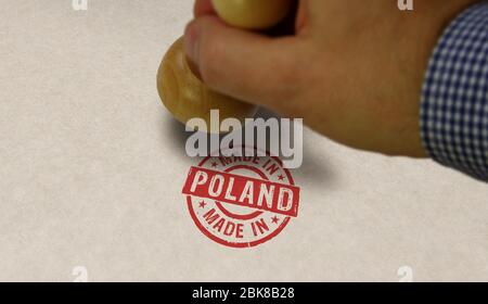 Stampato in Polonia e mano di stampaggio. Concetto di fabbrica, produzione e paese di produzione. Foto Stock