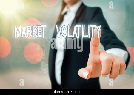 Nota scritta che mostra la volatilità del mercato. Concetto di business per i prezzi dei titoli sottostanti fluttuano lo stato di stabilità Foto Stock