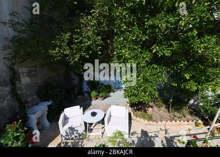 The Harbour House, Paxos, Grecia. E' una casa vacanze Simpson Travel situata sul bordo delle acque nel cuore di Gaios. Il giardino sul tetto. Foto Stock