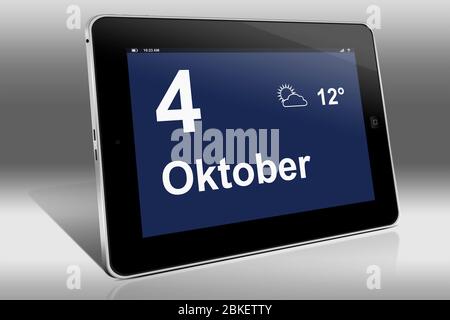 Un tablet visualizza un calendario in lingua tedesca con la data 4 ottobre | Ein Tablet-computer zeigt das Datum 4. Oktober Foto Stock