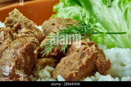 Manzo Suggerimenti sul riso, tenero stufato di manzo cotto, cibo comfort del sud. Foto Stock