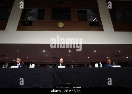 Washington, Stati Uniti. 7 maggio 2020. Kenneth Braithwaite (L), nominato segretario della Marina; James Anderson, nominato vice segretario della Difesa per la politica; e il Gen. Charles Q. Brown, Jr.(R), nominato per la riconferma come capo di Stato maggiore dell'aviazione militare statunitense; Testimoniate durante la loro audizione di nomina dei servizi armati del Senato a Capitol Hill a Washington, DC, Giovedi 7 maggio 2020. Foto di Kevin Dietsch/UPI Credit: UPI/Alamy Live News Foto Stock