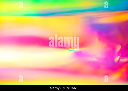 Astratto Arte digitale liscia di un sfocato morbido incandescente festoso sfondo felice con spettro retro colori caramelle gradiente neon Foto Stock