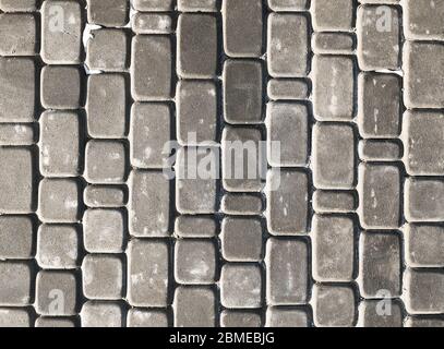 Sfondo in pietra grigio brillante. Sfondo fatto di materiale naturale. Superficie ruvida Foto Stock