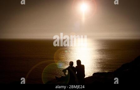 Peregrinos en el Cabo de Finisterre (fin del Camino de Santiago). La Coruña. Galizia. España Foto Stock