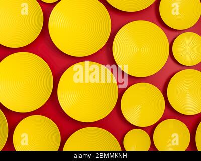 Scena astratta con disco rotondo giallo o piastre su sfondo rosso. Motivo a punti Polka. rendering 3d Foto Stock