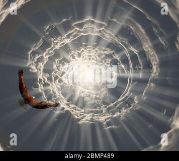Surrealismo. Eagle vola nel tunnel delle nuvole alla luce Foto Stock