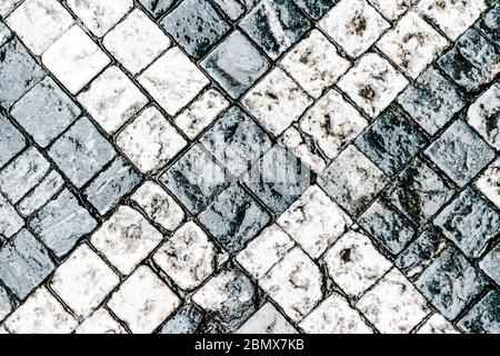 Motivo a forma di Cobblestone bianco e grigio Foto Stock