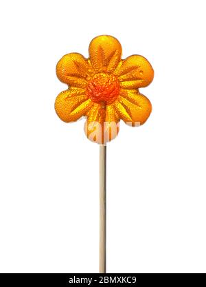 caramelle colorate su un bastone sotto forma di cuore di cockerel e fiori Foto Stock