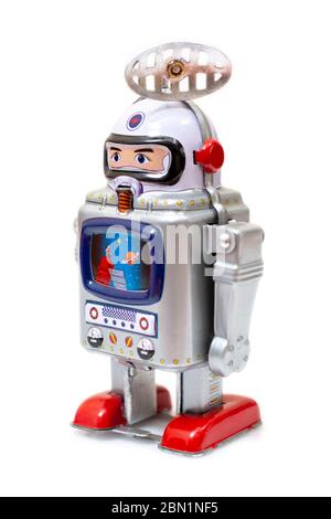 Vintage tin robot giocattolo isolato su uno sfondo bianco. Foto Stock