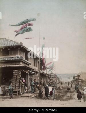 Villaggio strada con banner carp festival Foto Stock