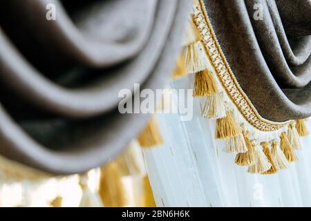 Dettaglio di rivestimenti per tende a teatro primo piano in tessuto Foto Stock